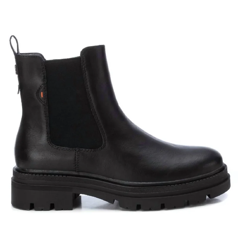 Women's Combat Boots with Studded Details in Olive Green for an Edgy Punk LookWomen's Chelsea Boots In Black