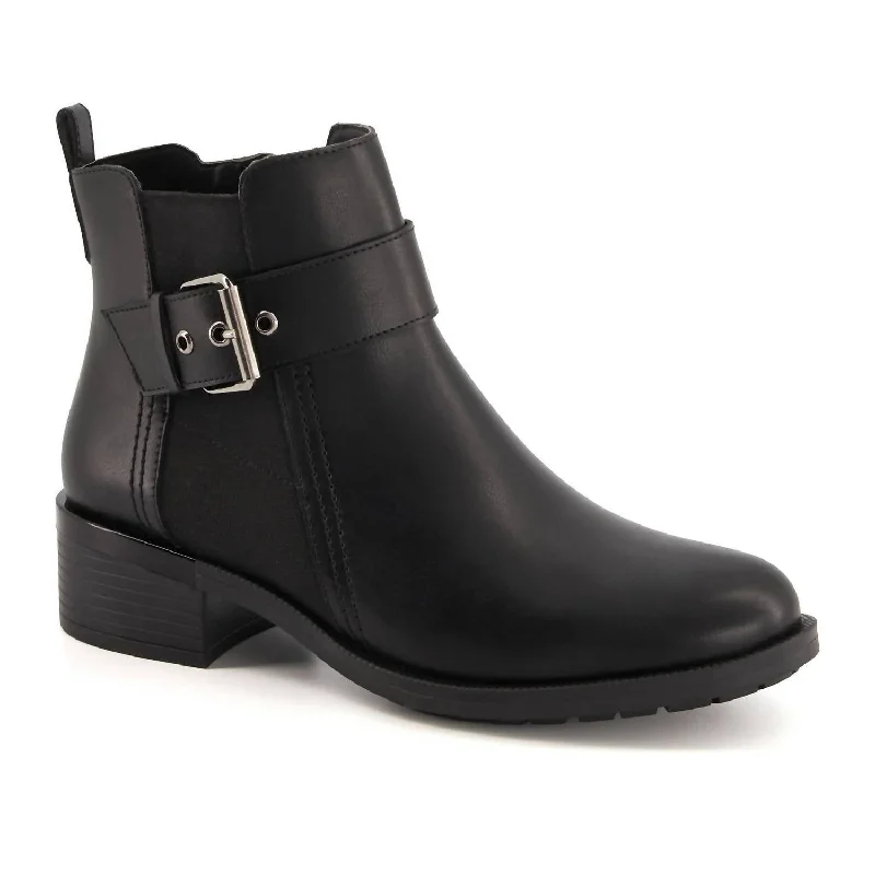 Women's Ankle Boots with Cut - Out Details in Beige for a Unique and Stylish EdgeWomen's Leather Booties With Elastic Side And Buckle In Black